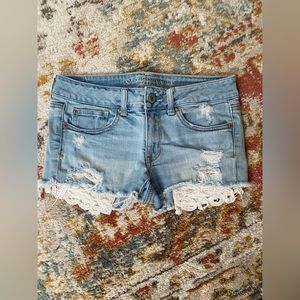 American Eagle jean shorts with peekaboo lace pockets